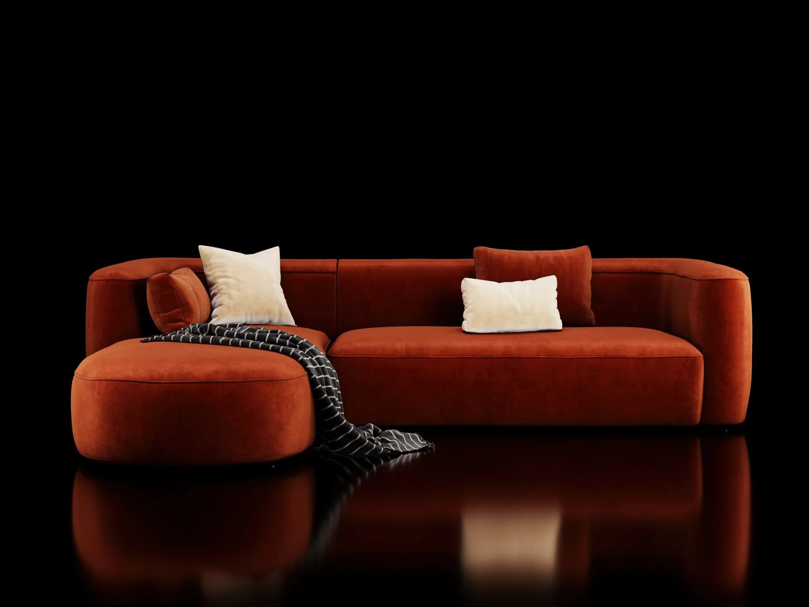 Terracotta upholstered modular sofa with cream cushions